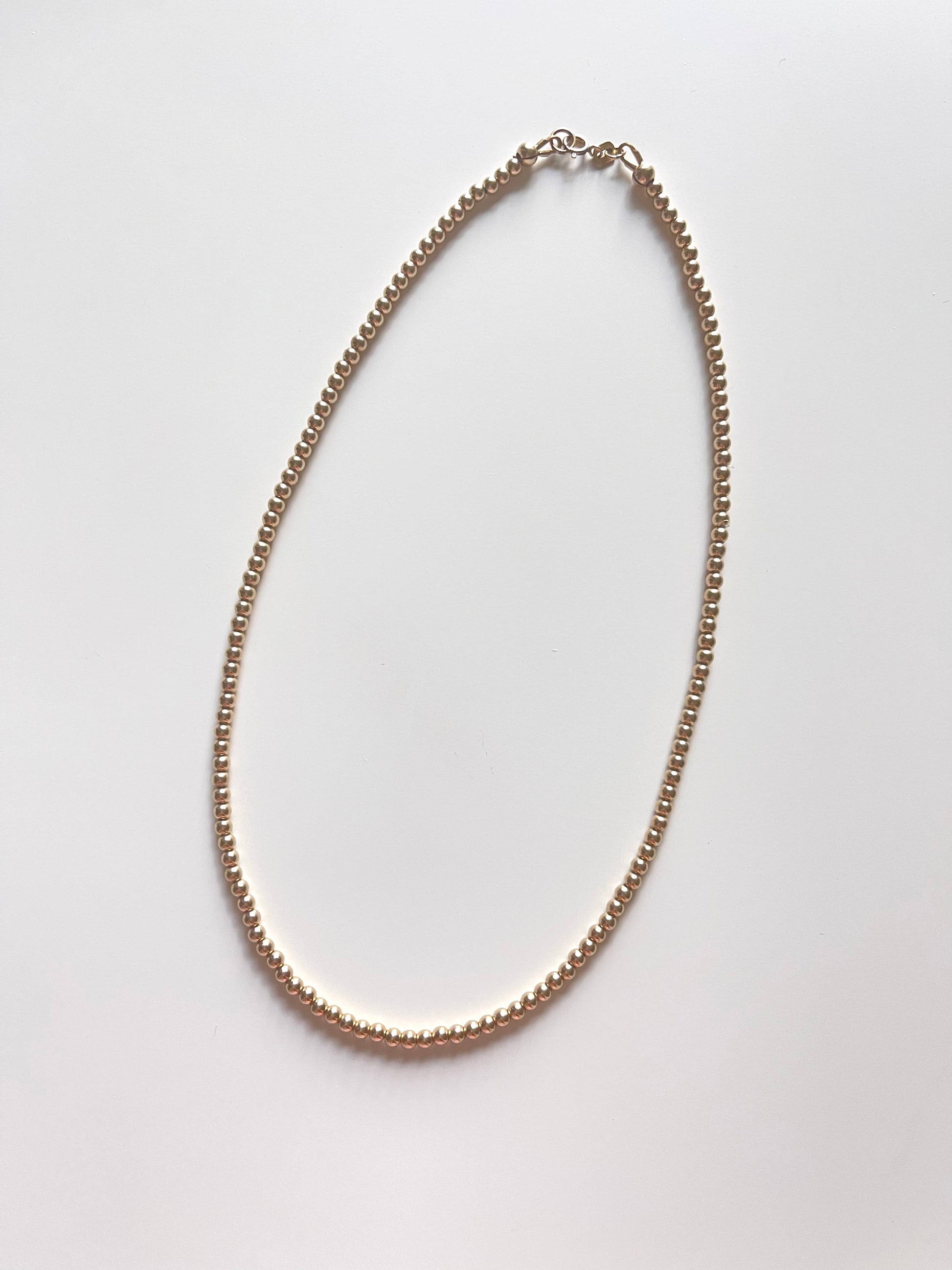 the golden necklace