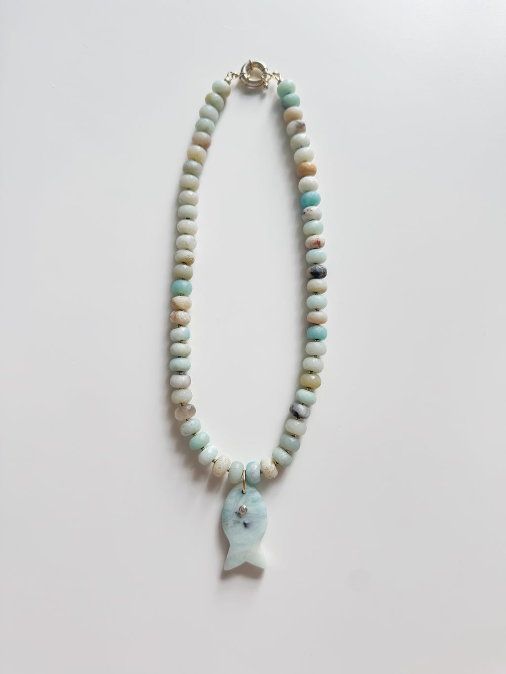the gemstone fish pendant