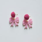 the acrylic bow earring