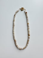 the gemstone necklace