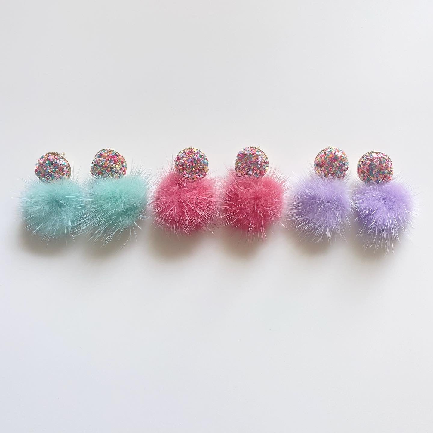 the glitter puff earring